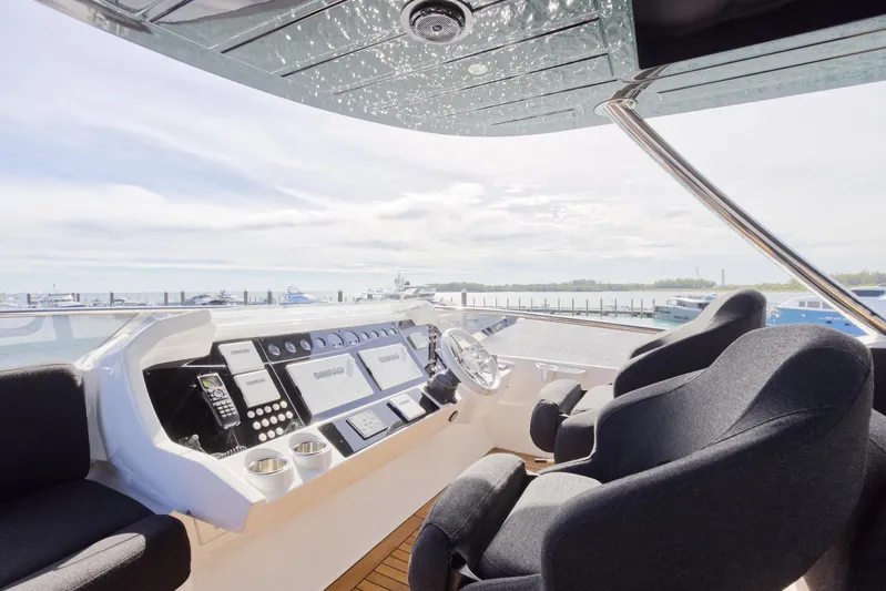 Alexa Yacht Photos Pics Sunseeker 86 Yacht 2018 helm station with ocean view and modern controls.