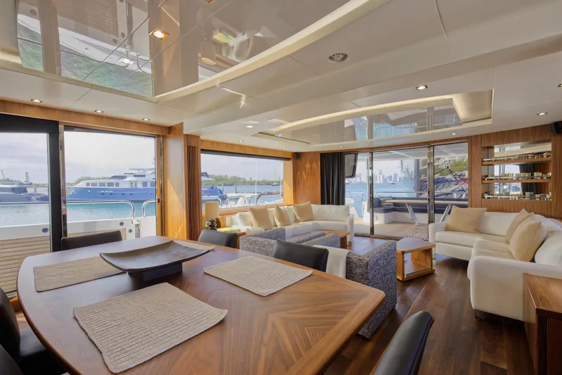 Alexa Yacht Photos Pics Luxurious interior of 2018 Sunseeker 86 Yacht with elegant dining and seating areas.