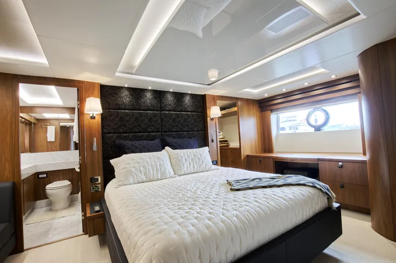 Alexa Yacht Photos Pics Luxurious bedroom on the 2018 Sunseeker 86 Yacht with modern decor and ample natural light.