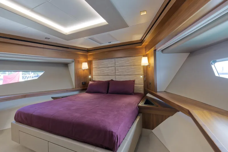 Alexa Yacht Photos Pics Luxurious bedroom on 2018 Sunseeker 86 Yacht with modern design and purple bedding.