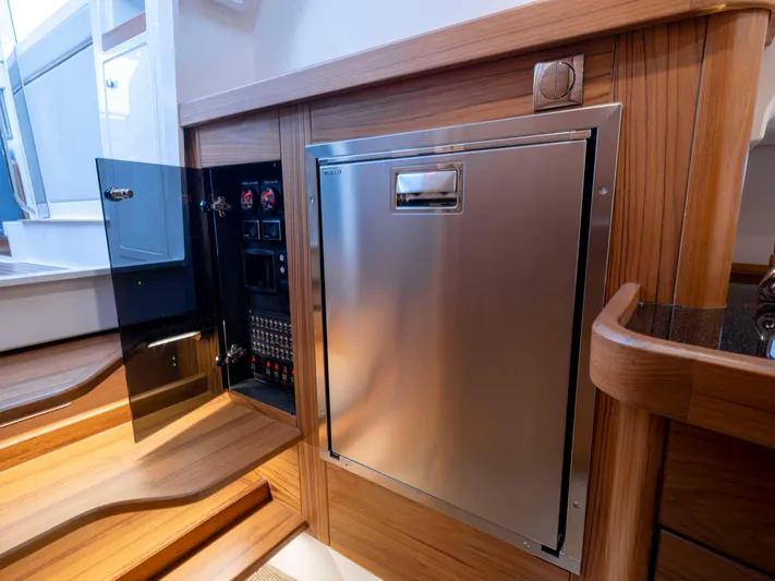  Yacht Photos Pics Modern interior of 2024 Nimbus C-11 yacht with stainless steel appliances.