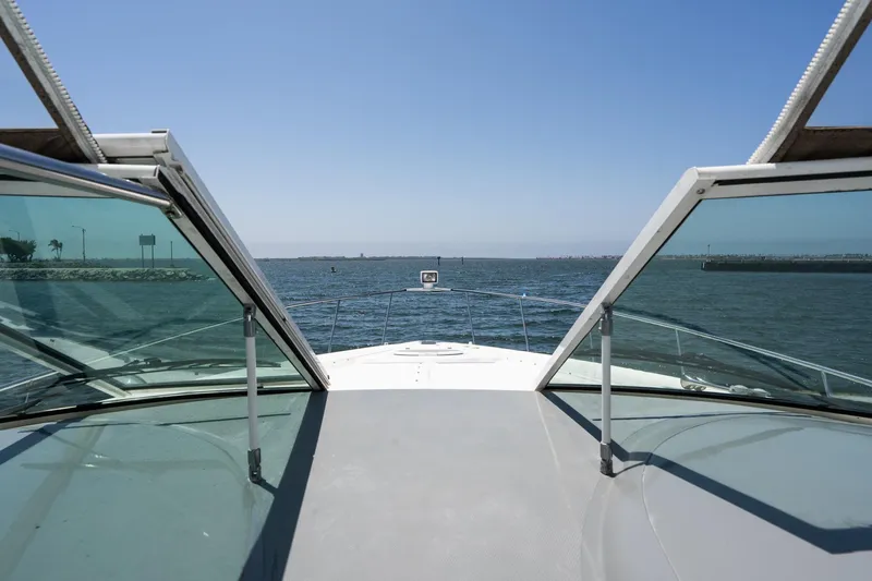 My Jojo Yacht Photos Pics 2005 Cruisers Yachts 370 Express on open water, viewed from the deck.