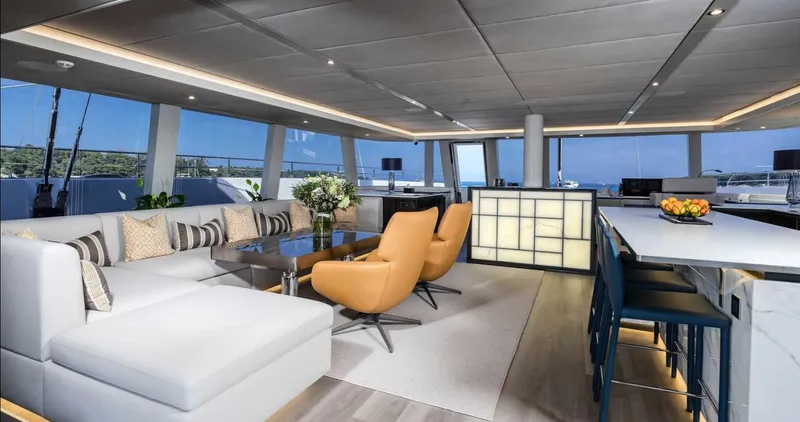 Endless Horizon II Yacht Photos Pics Luxurious interior of 2022 Sunreef 80 Sail yacht with modern seating and elegant decor.