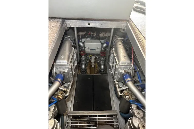  Yacht Photos Pics Engine room of 1989 Viking 41 Sportfish Convertible boat, showcasing mechanical components.