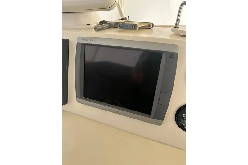  Yacht Photos Pics Garmin GPS display on 1989 Viking 41 Sportfish Convertible boat dashboard.