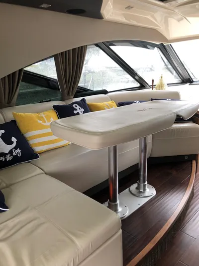 Flot D'amour Xx Yacht Photos Pics Interior of 2014 Sea Ray 510 Sundancer yacht with elegant seating and nautical-themed cushions.