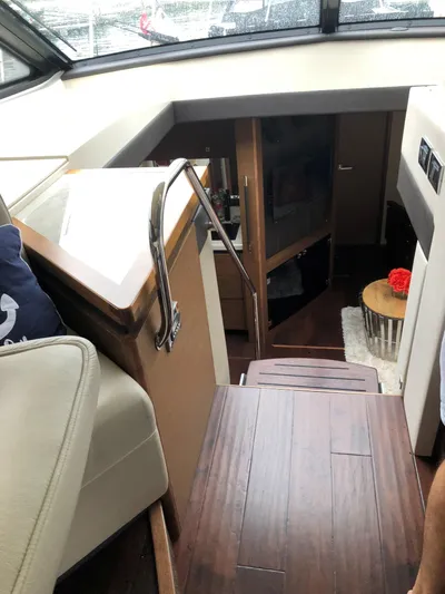 Flot D'amour Xx Yacht Photos Pics Interior view of 2014 Sea Ray 510 Sundancer yacht with wooden flooring and modern design.
