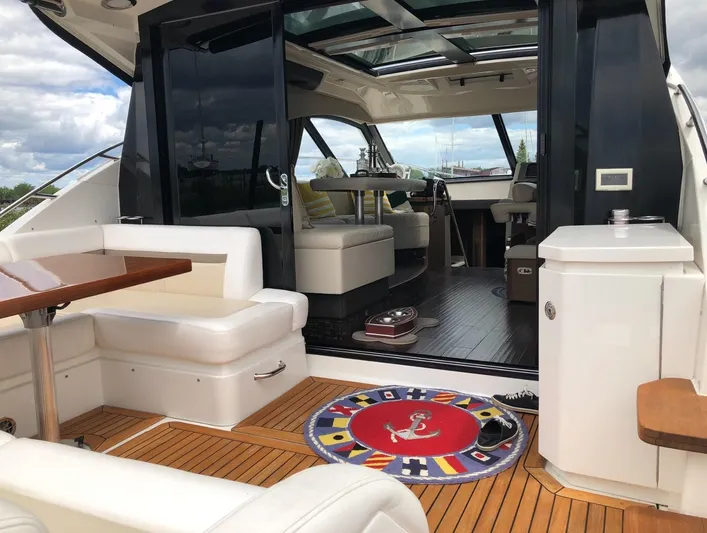 Flot D'amour Xx Yacht Photos Pics Luxurious 2014 Sea Ray 510 Sundancer yacht interior with elegant seating and wooden flooring.