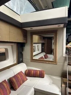 Flot D'amour Xx Yacht Photos Pics Interior of 2014 Sea Ray 510 Sundancer yacht with modern seating and decorative pillows.
