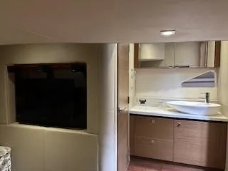 Flot D'amour Xx Yacht Photos Pics Interior of 2014 Sea Ray 510 Sundancer yacht with modern bathroom and TV.