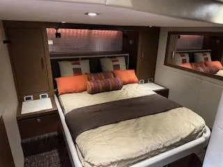 Flot D'amour Xx Yacht Photos Pics Luxurious bedroom interior of 2014 Sea Ray 510 Sundancer yacht with cozy bedding.