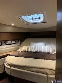 Flot D'amour Xx Yacht Photos Pics Luxurious cabin interior of 2014 Sea Ray 510 Sundancer yacht with cozy bedding.