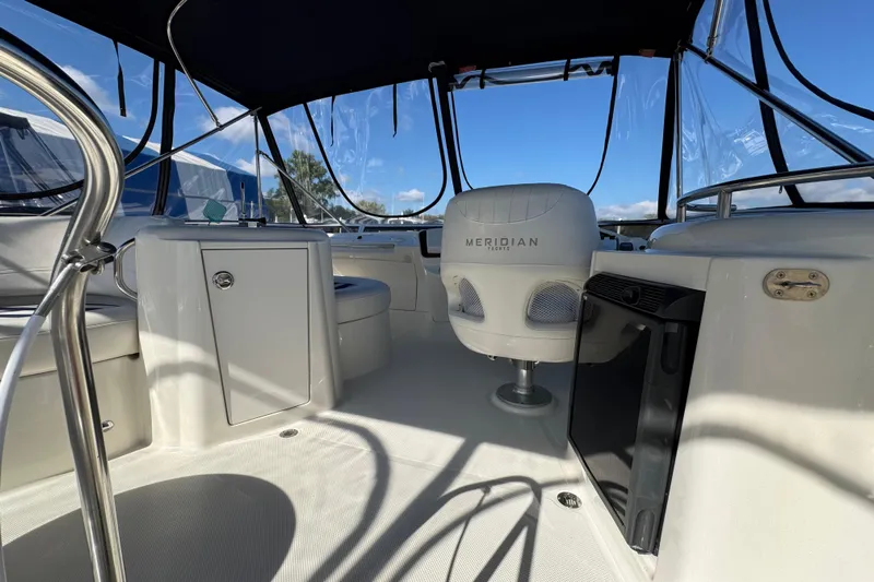 Old Hickory Yacht Photos Pics 2008 Meridian 391 Sedan yacht interior with seating and helm, under a clear canopy.