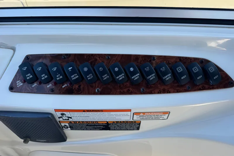 Old Hickory Yacht Photos Pics Control panel of a 2008 Meridian 391 Sedan boat with labeled switches.