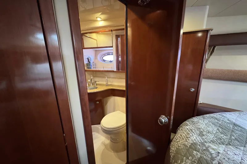 Old Hickory Yacht Photos Pics Luxurious bathroom interior of 2008 Meridian 391 Sedan yacht with wood finishes.