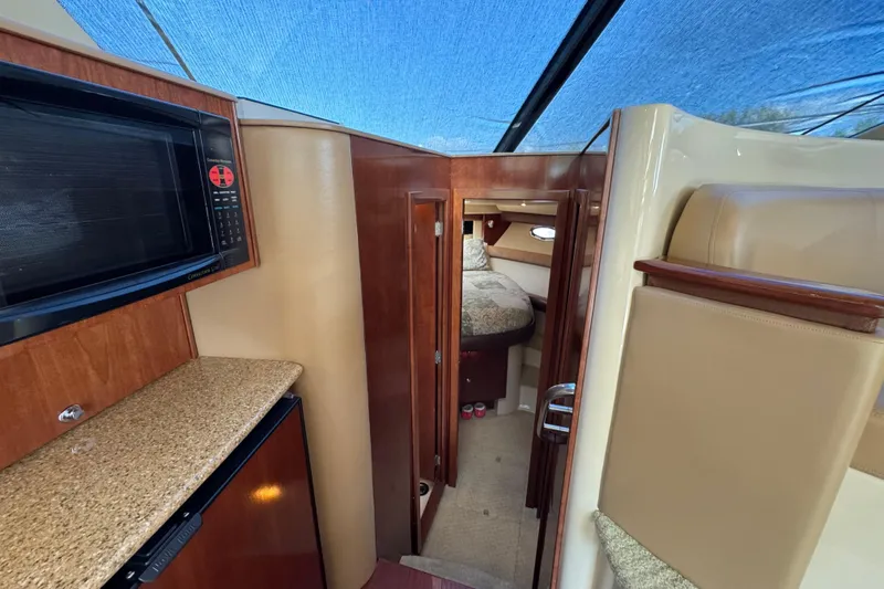 Old Hickory Yacht Photos Pics Interior of 2008 Meridian 391 Sedan yacht with kitchenette and cozy cabin.