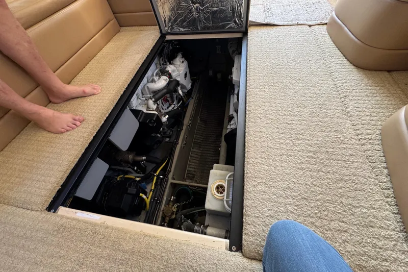 Old Hickory Yacht Photos Pics 2008 Meridian 391 Sedan engine compartment with beige interior and visible machinery.