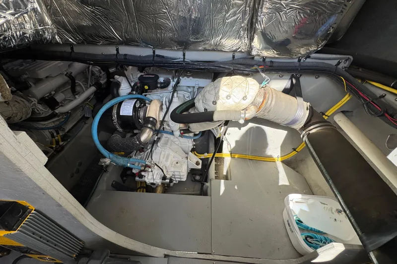 Old Hickory Yacht Photos Pics Engine compartment of a 2008 Meridian 391 Sedan boat, showcasing mechanical components.
