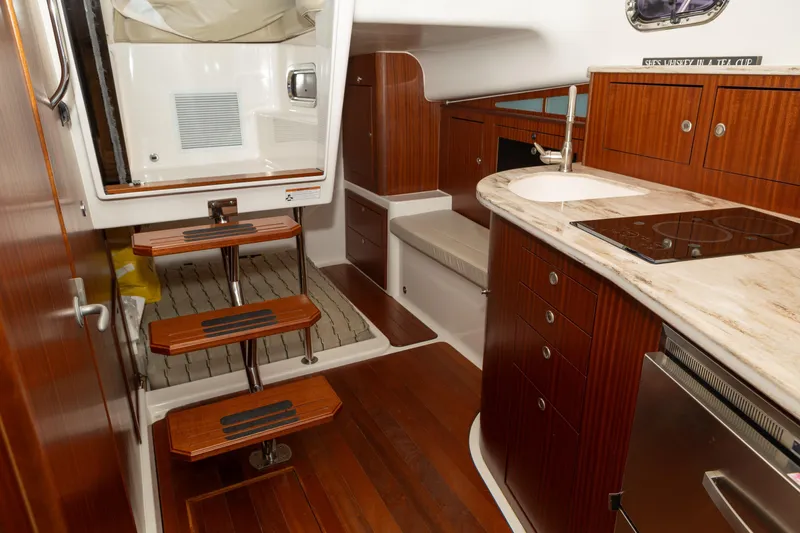 Tracker Yacht Photos Pics Pursuit 38 TRACKER - Cabin Entrance and Galley