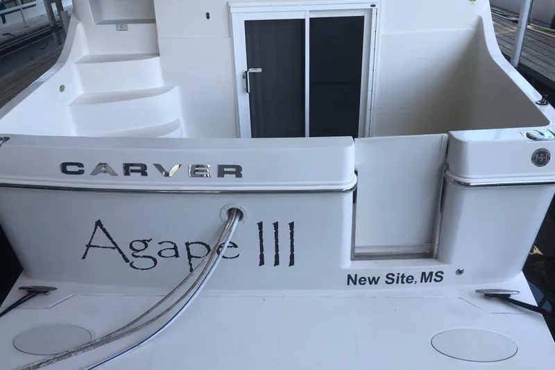 Agape III Yacht Photos Pics 2005 Carver 41 Cockpit Motor Yacht, rear view, docked, named Agape III from New Site, MS.