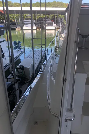 Agape III Yacht Photos Pics 2005 Carver 41 Cockpit Motor Yacht docked at marina.