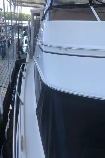 Agape III Yacht Photos Pics 2005 Carver 41 Cockpit Motor Yacht docked at marina.