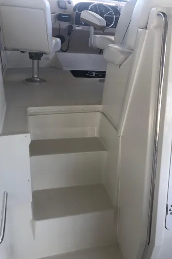 Agape III Yacht Photos Pics Staircase leading to the helm of a 2005 Carver 41 Cockpit Motor Yacht.