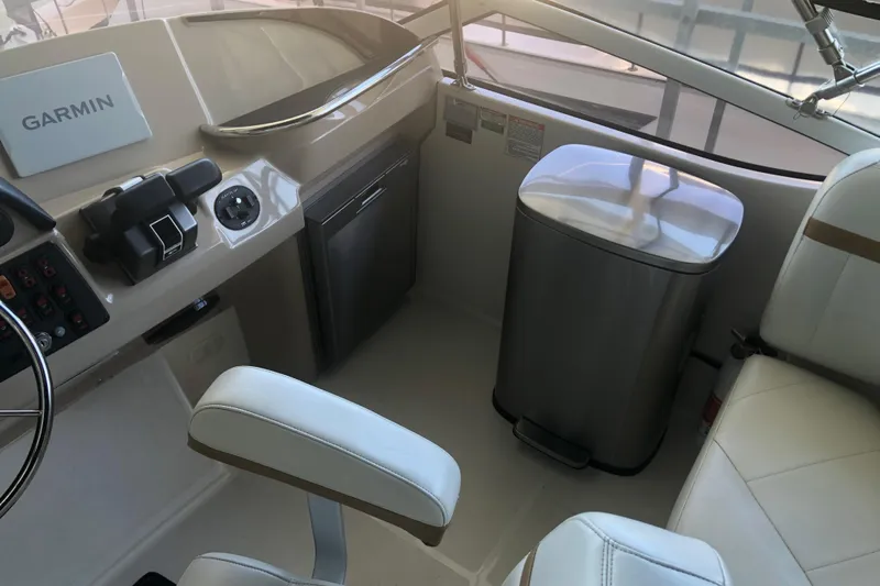 Agape III Yacht Photos Pics 2005 Carver 41 Cockpit Motor Yacht helm with Garmin navigation system.