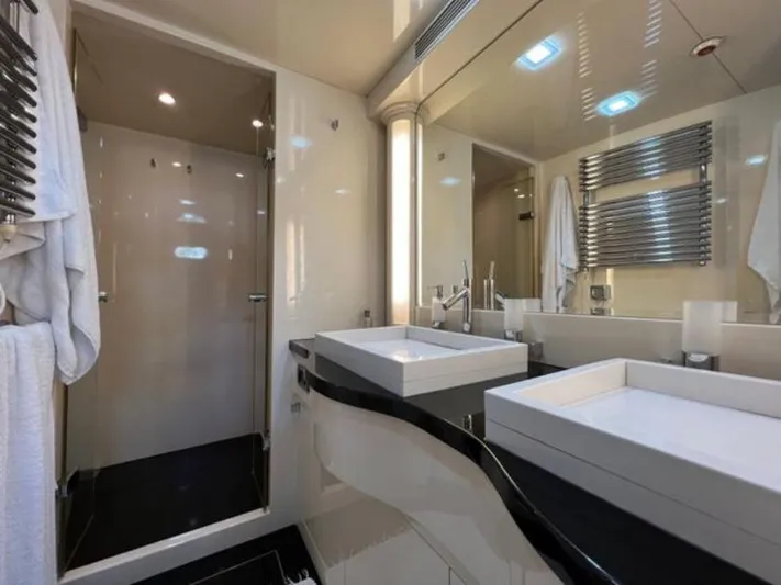  Yacht Photos Pics Luxurious bathroom in 2008 Horizon Elegance 90 Mega yacht with modern fixtures and sleek design.
