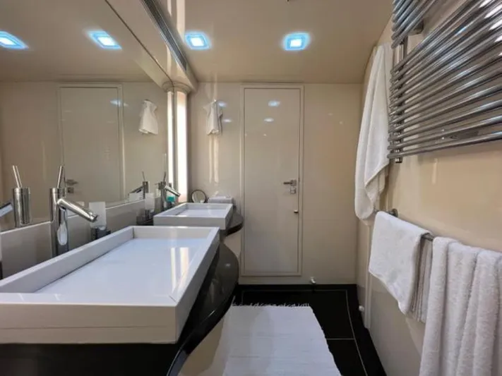  Yacht Photos Pics Luxurious bathroom interior of 2008 Horizon Elegance 90 Mega yacht with modern fixtures.