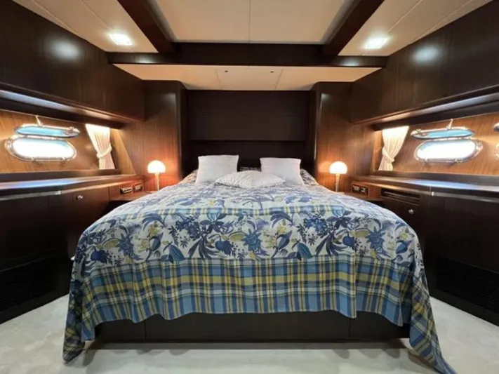  Yacht Photos Pics Luxurious bedroom interior of 2008 Horizon Elegance 90 Mega yacht with elegant bedding and lighting.