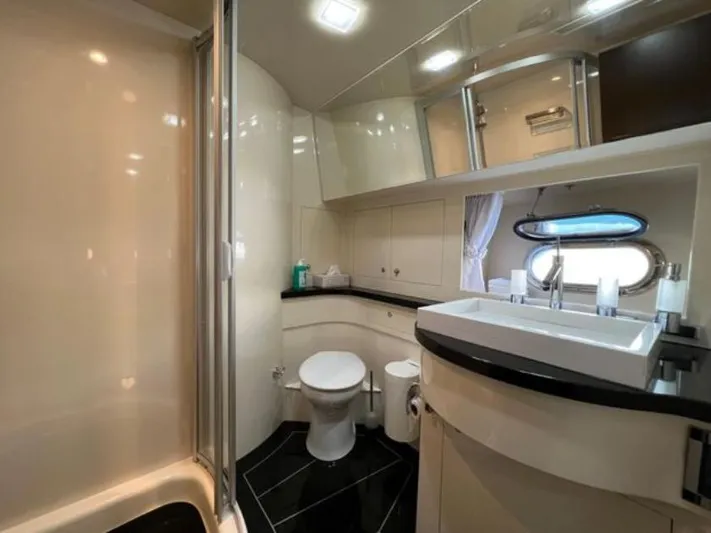  Yacht Photos Pics Luxurious bathroom in 2008 Horizon Elegance 90 Mega yacht with modern fixtures and sleek design.