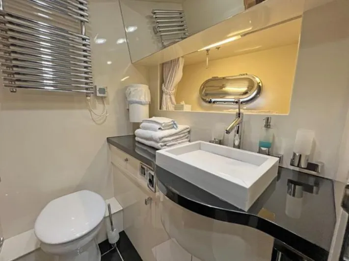 Yacht Photos Pics Luxurious bathroom in 2008 Horizon Elegance 90 Mega yacht with modern fixtures and sleek design.