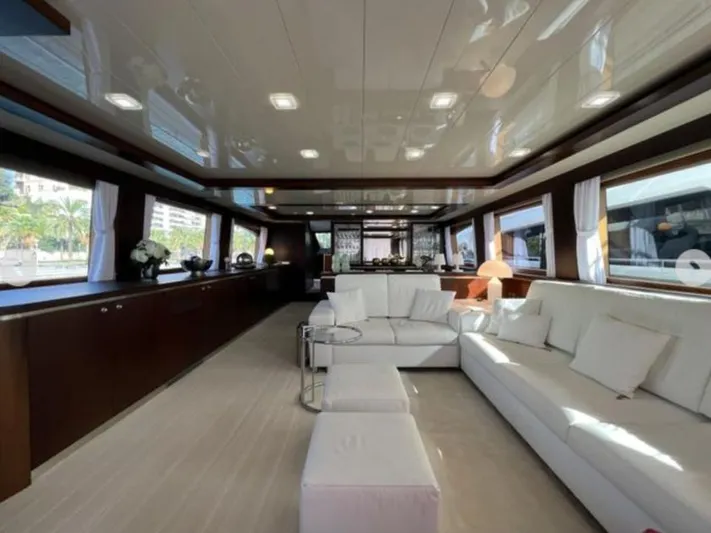  Yacht Photos Pics Luxurious interior of 2008 Horizon Elegance 90 Mega yacht with white sofas and large windows.