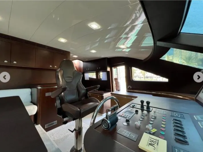  Yacht Photos Pics Luxurious interior of 2008 Horizon Elegance 90 Mega yacht cockpit with control panel.