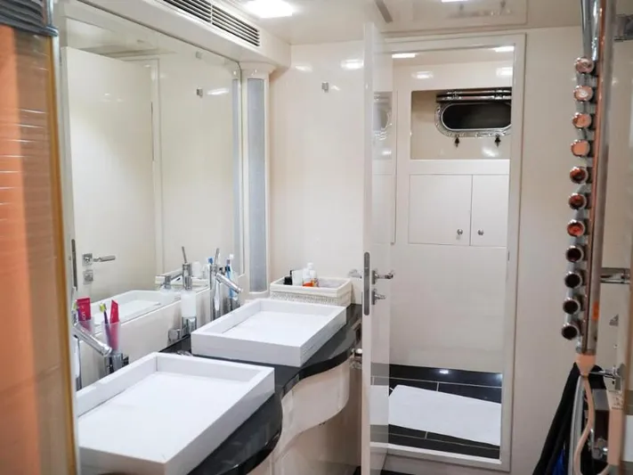  Yacht Photos Pics Luxurious bathroom in 2008 Horizon Elegance 90 Mega yacht, featuring dual sinks and modern fixtures.