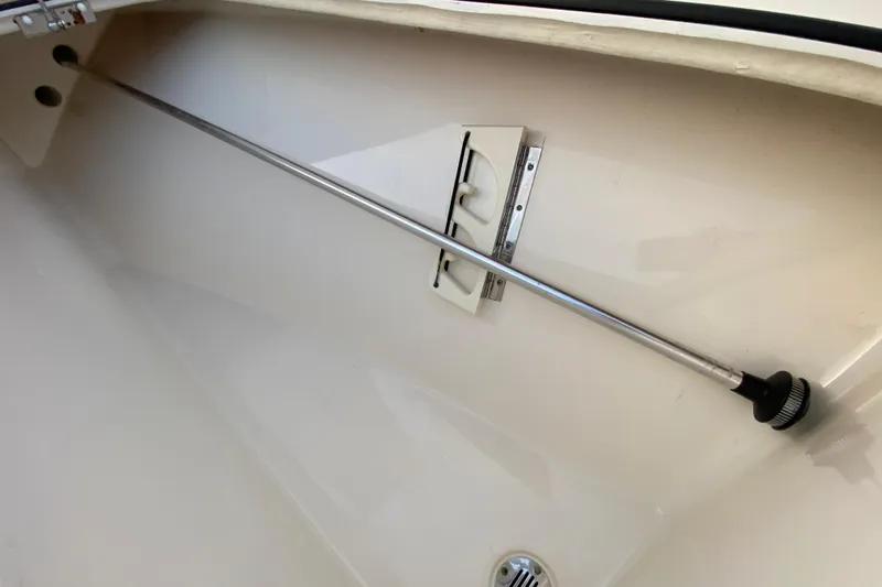  Yacht Photos Pics Interior of a 2020 Pathfinder 2500 Hybrid boat, featuring a storage compartment.