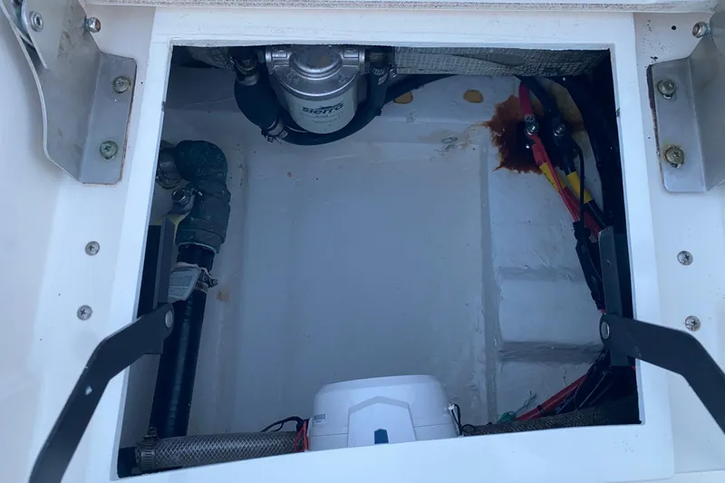  Yacht Photos Pics 2020 Pathfinder 2500 Hybrid boat compartment with visible wiring and components.