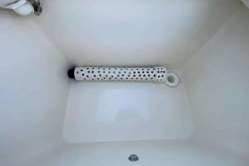  Yacht Photos Pics White compartment with perforated tube inside a 2020 Pathfinder 2500 Hybrid.