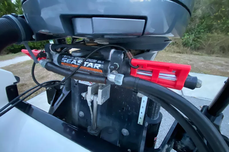  Yacht Photos Pics Close-up of SeaStar hydraulic steering on a 2020 Pathfinder 2500 Hybrid boat.