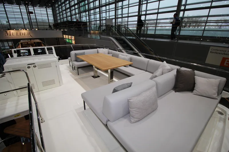  Yacht Photos Pics Luxurious seating area on 2025 Prestige M48 yacht, featuring modern design and spacious layout.