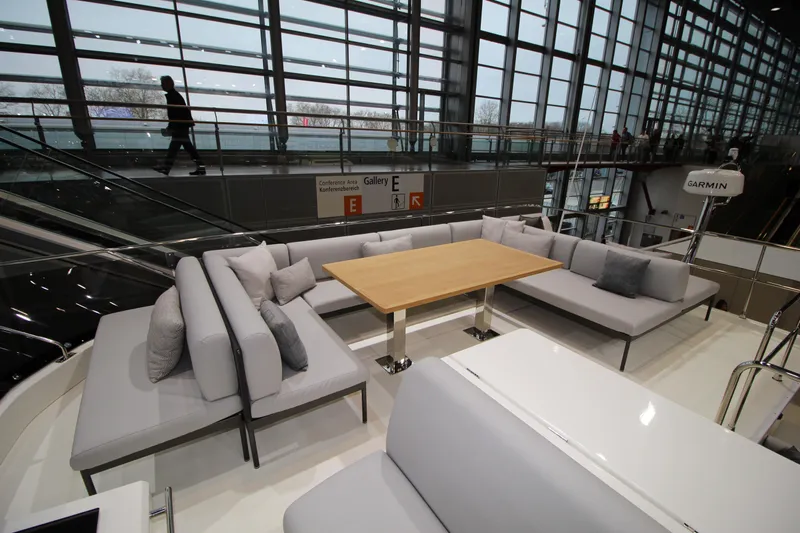  Yacht Photos Pics Luxurious seating area on 2025 Prestige M48 yacht, featuring modern design and spacious comfort.