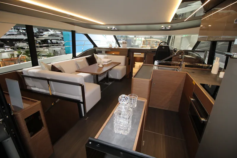  Yacht Photos Pics Luxurious interior of 2025 Prestige M48 yacht with modern furnishings and elegant design.