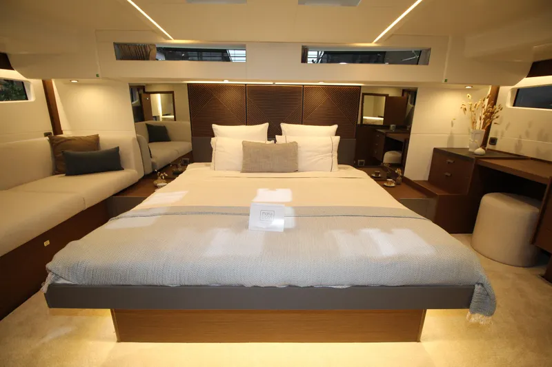  Yacht Photos Pics Luxurious interior of 2025 Prestige M48 yacht with elegant bedroom design.