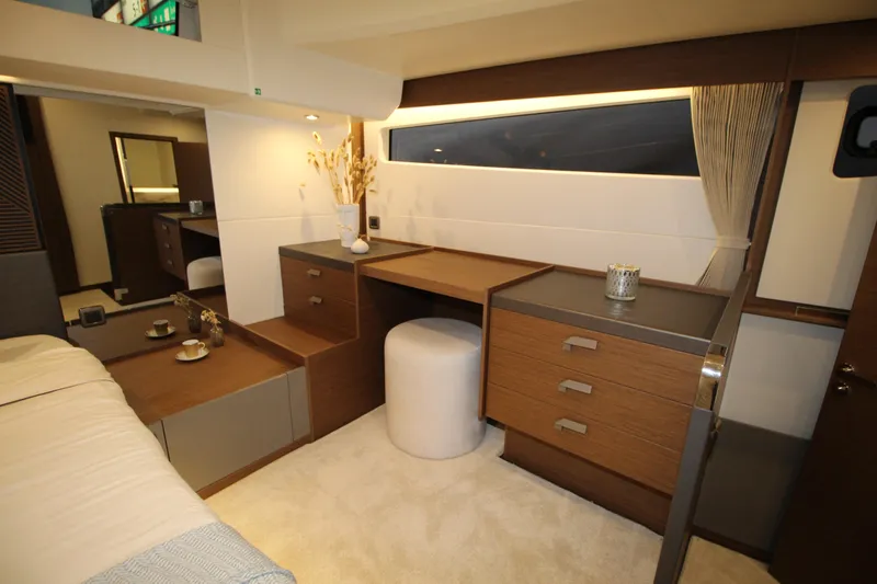 Yacht Photos Pics Luxurious interior of 2025 Prestige M48 yacht with modern furnishings and elegant design.