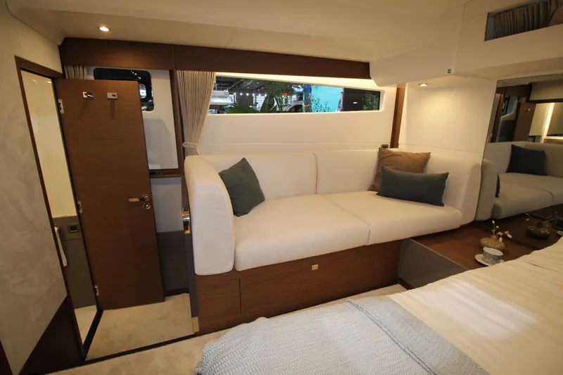  Yacht Photos Pics Luxurious interior of 2025 Prestige M48 yacht with elegant seating and modern decor.