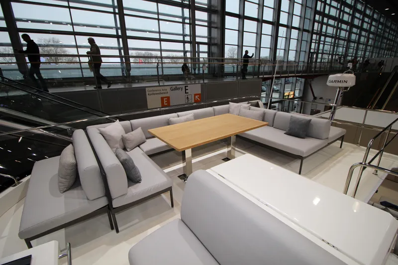  Yacht Photos Pics Luxurious seating area on the 2025 Prestige M48 yacht, featuring modern design and comfort.