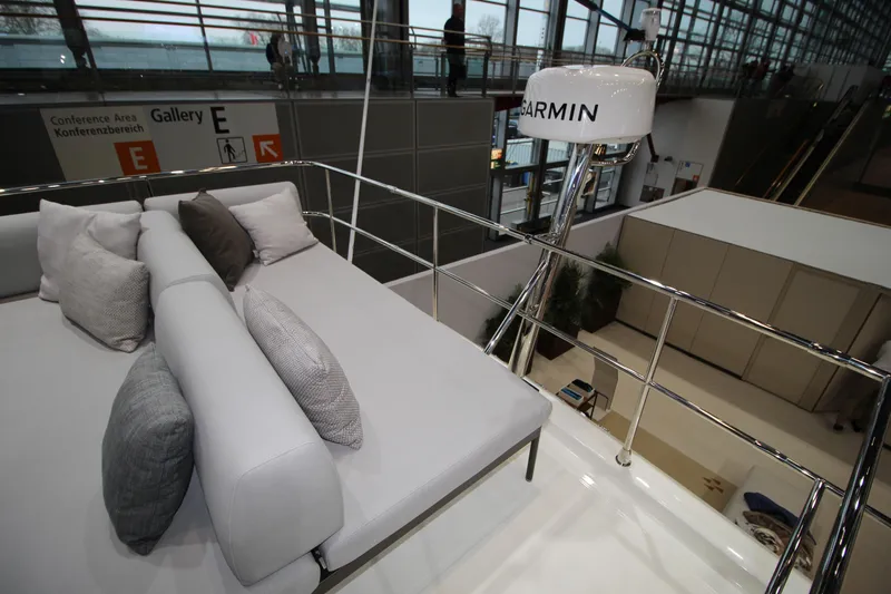  Yacht Photos Pics Luxurious seating area on 2025 Prestige M48 yacht with Garmin equipment.