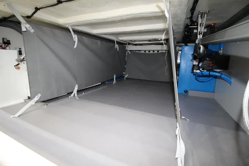  Yacht Photos Pics Interior view of a 2025 Prestige M48 yacht storage compartment.