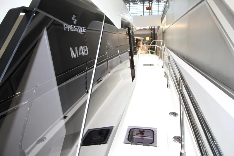  Yacht Photos Pics 2025 Prestige M48 yacht, sleek design, modern exterior, luxury marine vessel.